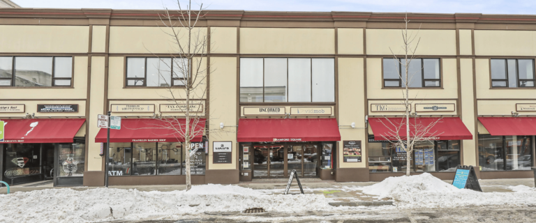 Crawford Square, a historic 1920s commercial building in downtown Pittsfield, MA, featuring retail and office spaces.
